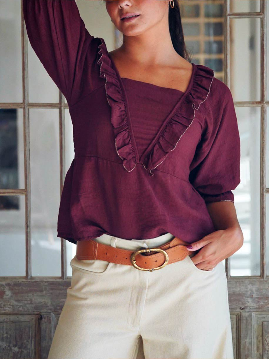 BLUSA ESCOTE VOLANTE