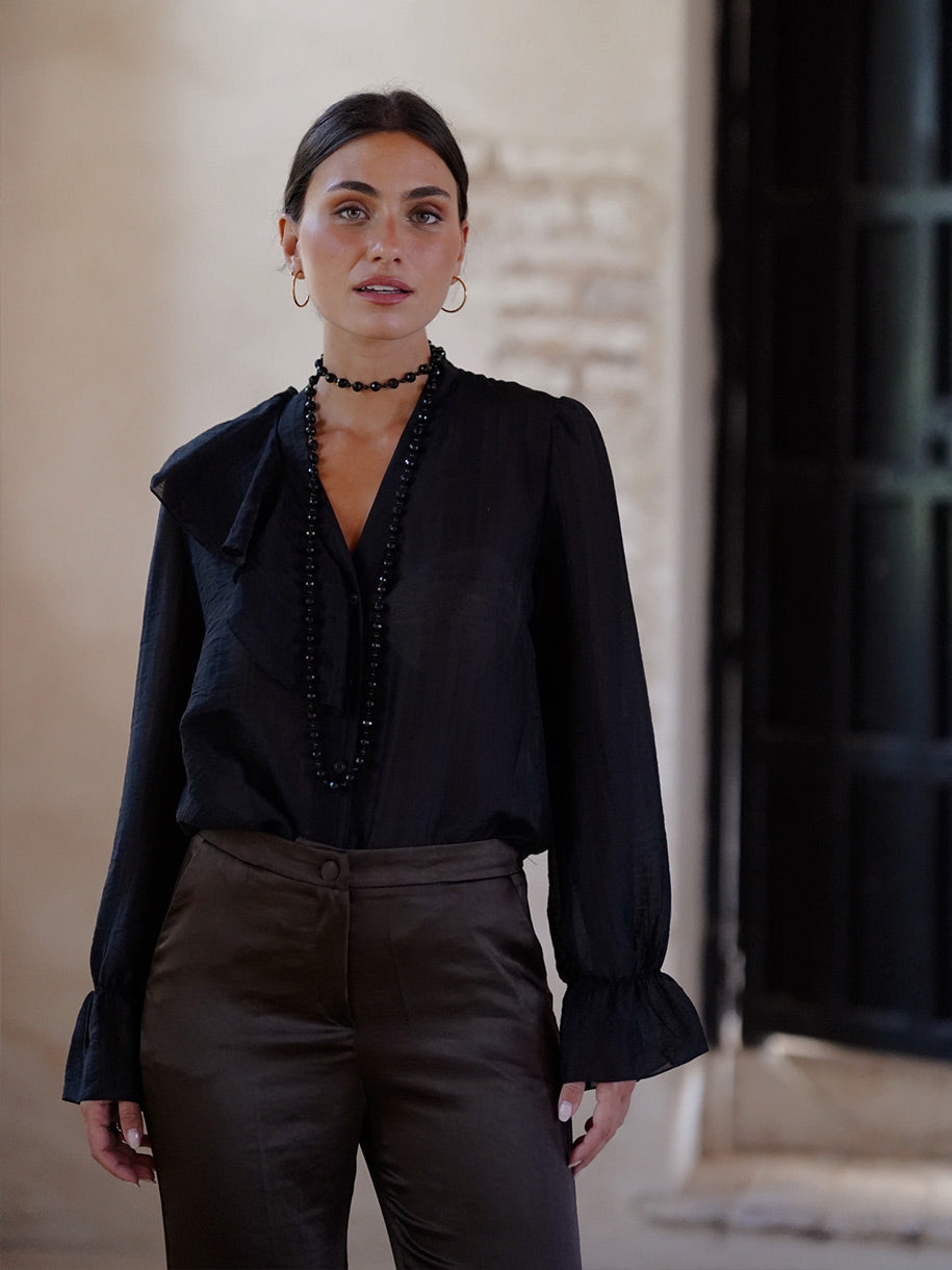 Camisa con volantes