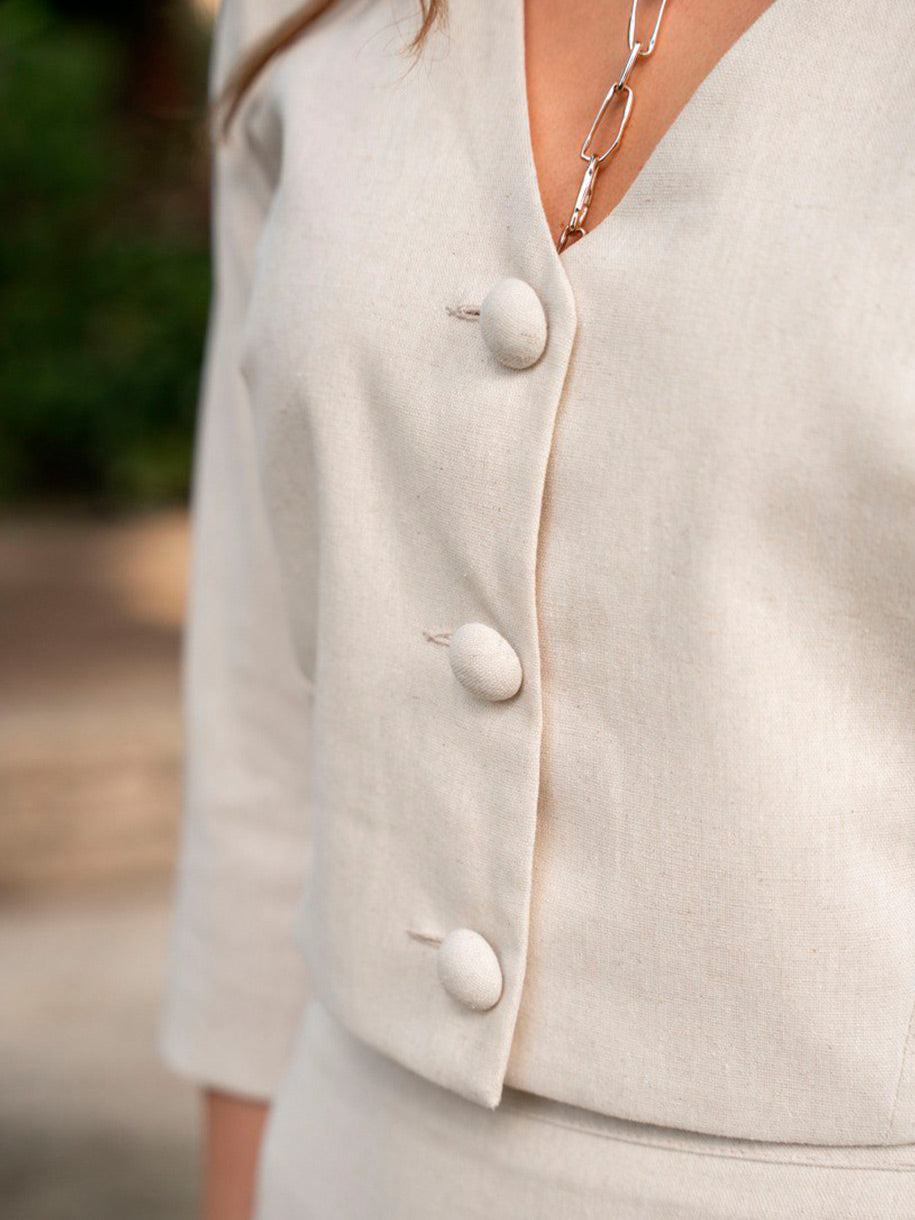 Blusa con botones forrados