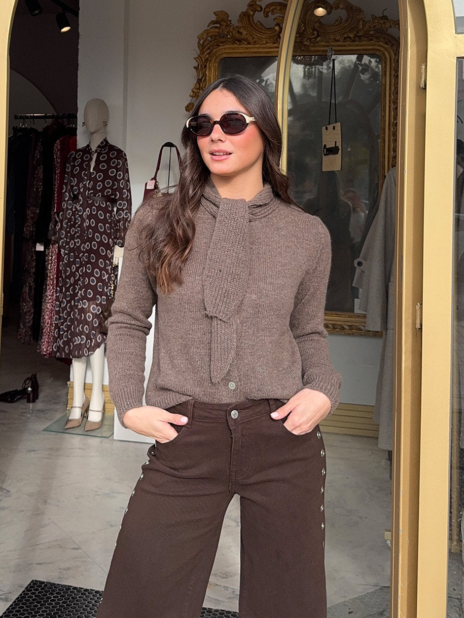 Jersey de mujer con lazo en el cuello