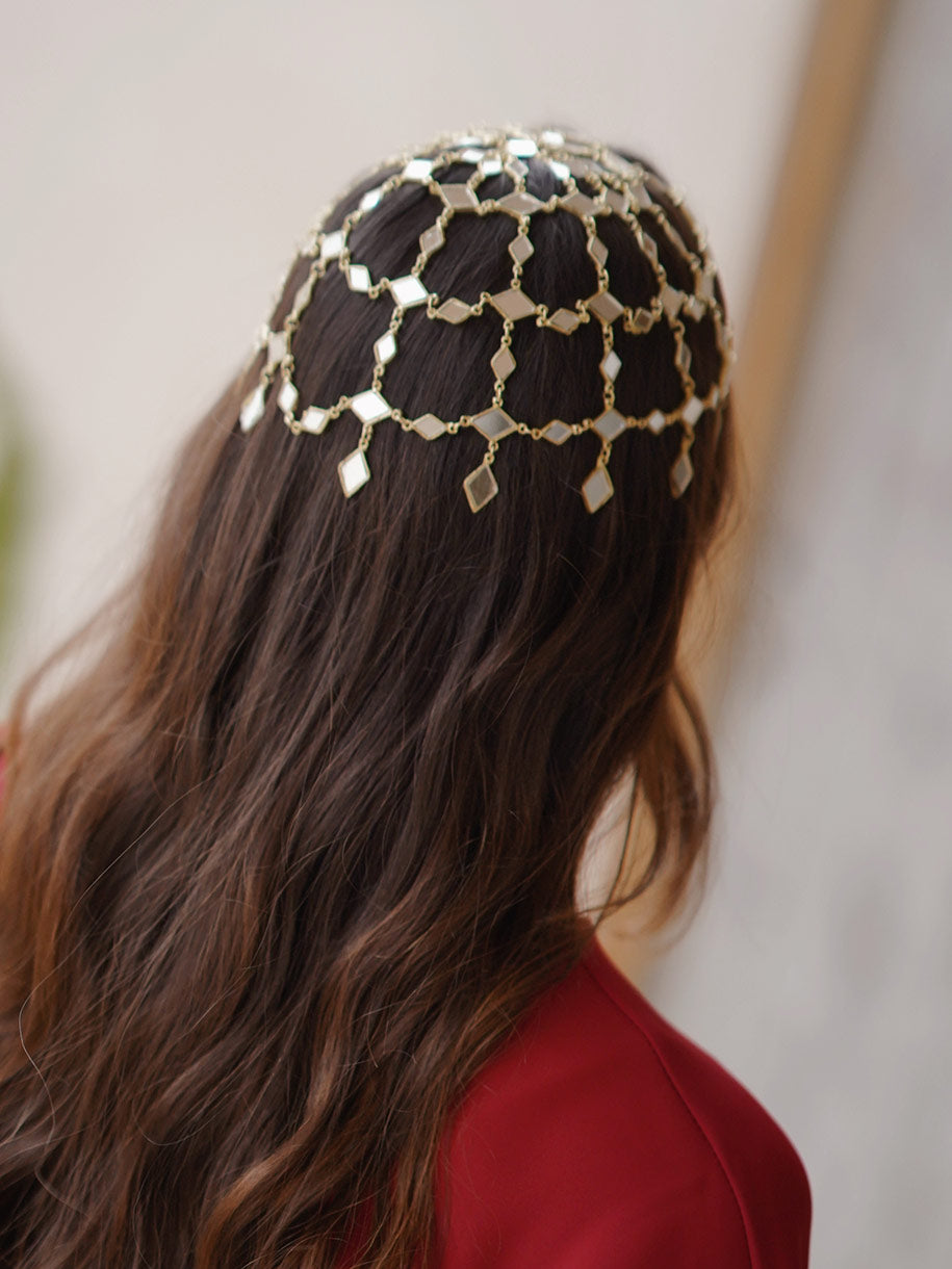 Casquete dorado con espejo