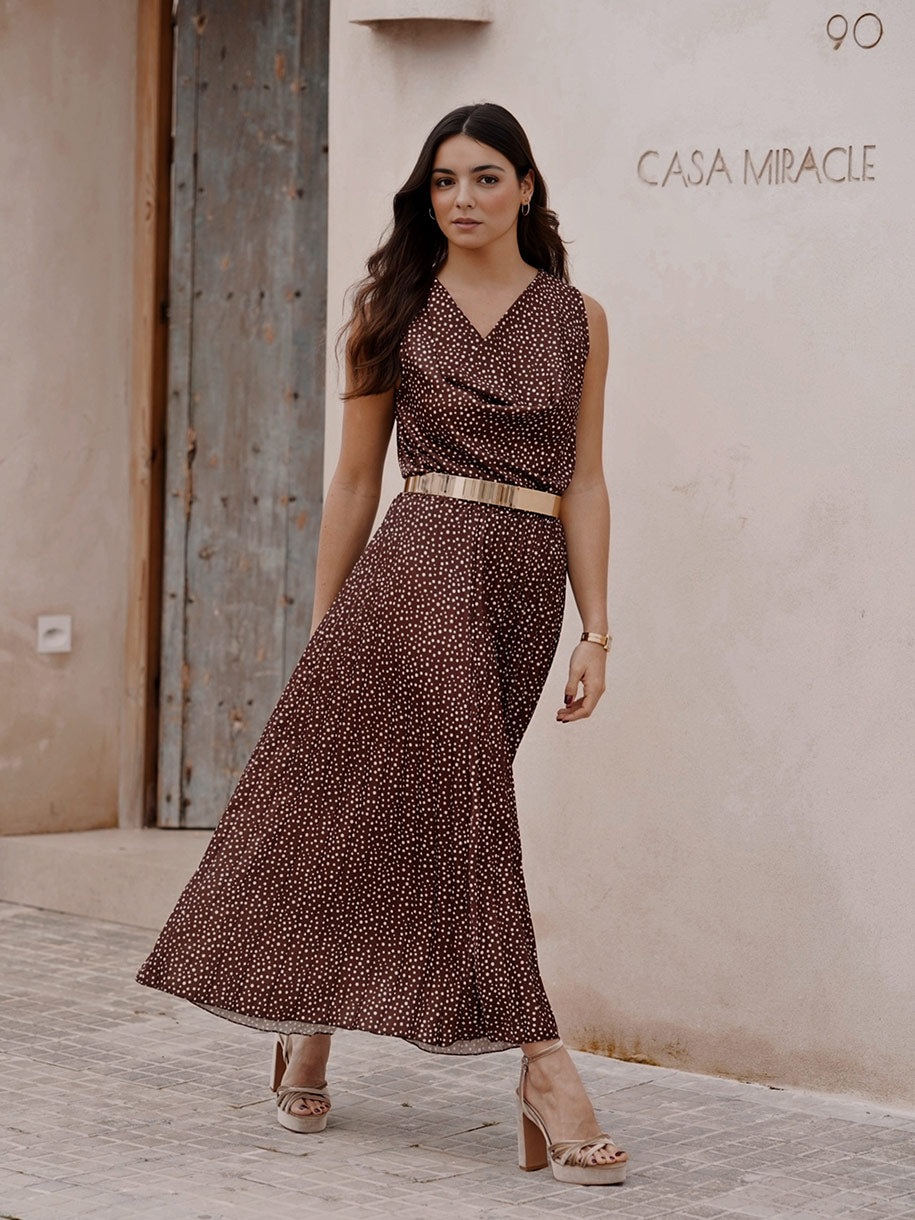 Conjunto formado por top y falda plisada